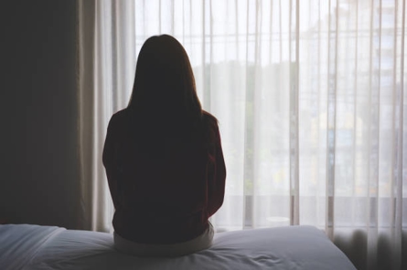 Woman looking out the window.