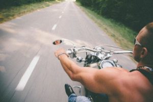 A man riding a motorcycle.