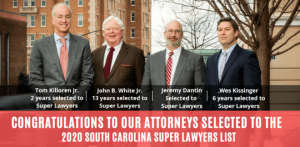 Four men are standing side by side, formally dressed, with a caption below each individual displaying their names and the duration of their inclusion in the Super Lawyers list. The backdrop highlights their accomplishments, specifically their recognition in the 2020 South Carolina Super Lawyers list.